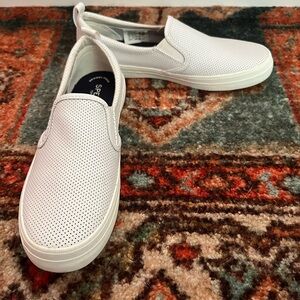 Women’s Sperry perforated white slip one, 7.5 size, new without tags